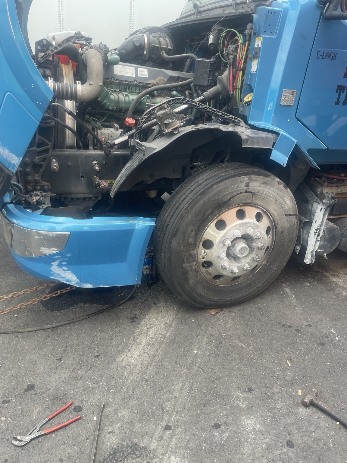Truck front-end roadside repair in progress